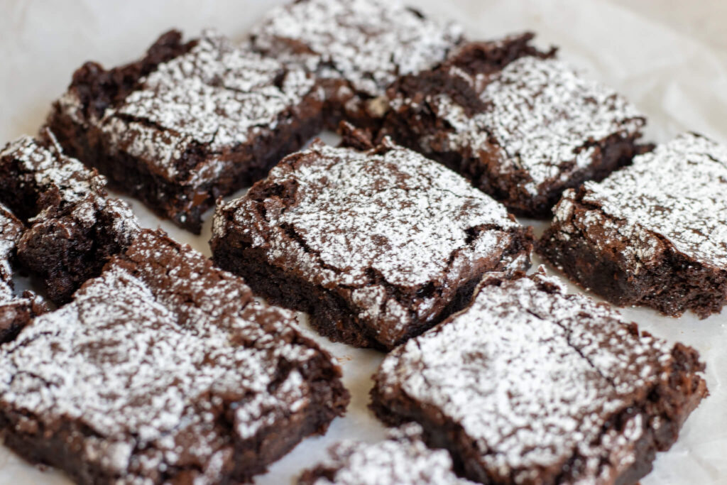 brownies with powdered sugar on top